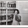 The canned goods closet, and chart (on door) of one of the project families. Terrebonne Project, Schriever, Louisiana