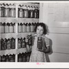 The canned goods closet, and chart (on door) of one of the project families. Terrebonne Project, Schriever, Louisiana