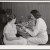 The project nurse takes a member's blood pressure during the prenatal clinic. Terrebonne Project, Schriever, Louisiana