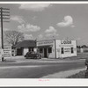 Signs advertising liquor stores are seen frequently along all Kentucky highways. South of Bardstown.