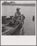 Boating and fishing along Cane River on Fourth of July near Natchitoches, Louisiana