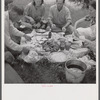 Farm family having fish fry on Fourth of July along Cane River. Near Natchitoches, Louisiana