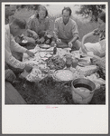 Farm family having fish fry on Fourth of July along Cane River. Near Natchitoches, Louisiana