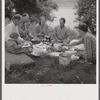 Farm family having fish fry along Cane River on Fourth of July near Natchitoches, Louisiana