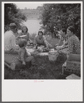 Farm family having fish fry on July Fourth along Cane River. Near Natchitoches, Louisiana