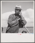 Member of Allen Plantation cooperative association resting while hoeing cotton. Near Natchitoches, Louisiana