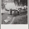 Boating and fishing along Cane River on Fourth of July near Natchitoches, Louisiana