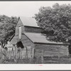 Melrose, Natchitoches Parish, Louisiana. "Trinity" barn by home [of multiracial people] in cotton plantation area