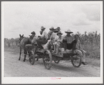 [Multiracial people] returning from town with groceries and supplies near Melrose, Natchitoches Parish, Louisiana