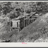 Mountain families in Kentucky "raise" their own coal in the back yard along roadsides. Up Morris Fork of Kentucky River.