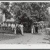 Mountain people and farmers exchanging news and greetings near the courthouse on court day. Campton, Wolfe County, Kentucky.