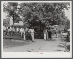 Mountain people and farmers exchanging news and greetings near the courthouse on court day. Campton, Wolfe County, Kentucky.