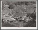 Mountaineers "raise" coal in their own backyard for home use. Up Squabble Creek, near Buckhorn, Kentucky.
