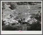 Mountaineers "raise" coal in their own backyard for home use. Up Squabble Creek, near Buckhorn, Kentucky.