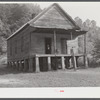 One-room schoolhouse showing overcrowded conditions and need for repairs and equipment. Breathitt County, Kentucky.