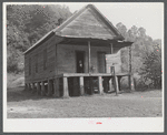 One-room schoolhouse showing overcrowded conditions and need for repairs and equipment. Breathitt County, Kentucky.