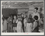 One-room schoolhouse showing overcrowded conditions and need for repairs and equipment. Breathitt County, Kentucky.