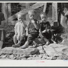 Children by the gate of their home up Stinking Creek, near Pine Mountain, Kentucky.