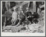 Children by the gate of their home up Stinking Creek, near Pine Mountain, Kentucky.