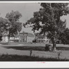 Church and rectory on the grounds of Saint Thomas' Church where a picnic is to be held. Near Bardstown, Kentucky.