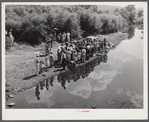 Members of the Primitive Baptist Church in Morehead, Kentucky, attending a creek baptizing by submersion.