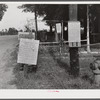 Signs in front of home near Anchorage, Kentucky.