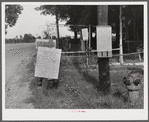 Signs in front of home near Anchorage, Kentucky.