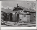 Shoe and harness repair shop and beauty shop. Shelby, Mississippi.