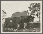 Sweezey's Red mill. Just west of Bridge Street, on arm of Peconic River. Remodelled and used as a storehouse. Riverhead, Riverhead