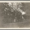 View of south side Main Street. Opposite Griffing Ave. Showing McDermott Real Estate & Insurance and Capitol Theater. Riverhead, Riverhead