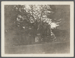 View of south side Main Street. Opposite Griffing Ave. Showing McDermott Real Estate & Insurance and Capitol Theater. Riverhead, Riverhead