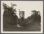 View of Grangebel Park and yellow brick tower. Tower was built about 1880 as part of gristmill by Judge Timothy Griffing (d.1924). Riverhead, Riverhead