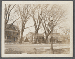 View of west side Main Street. Old Albert Payne house in center. New Mrs. Al. Payne house on left. Drugstore on right? East Hampton, East Hampton