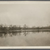 View of Artist Lake. Looking southwest from Middle Country Road. Formerly Glover's Pond, alias Curran's Pond. Boathouse in center. Middle Island, Brookhaven