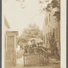 View of fenced lot between two houses. View from Hampton Road. Sag Harbor, Southampton