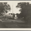 View of Main Street. Looking south from railroad extension. Hotel Bay View in center, Bay View Garage on left. Sag Harbor, Southampton