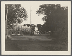 View of Main Street. Looking south from railroad extension. Hotel Bay View in center, Bay View Garage on left. Sag Harbor, Southampton