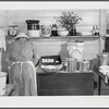 One of the Wilkins family making biscuits for dinner on cornshucking day at Mrs. Fred Wilkins' home near Tallyho, Granville County. North Carolina.