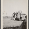 Men in uniform at military truck