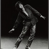 Publicity photograph of Whoopi Goldberg performing stand-up act  in leather pants