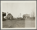 View of buildings. Looking east from Southampton Depot. On left is Southampton Coal and Produce Co., on right is Terry's? Hand Laundry. Southampton, Southampton