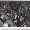 Tobacco auction in warehouse in Danville, Virginia where many Caswell County farmers sell their tobacco at auction. North Carolina.