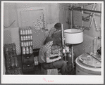 Pasteurizing and bottling milk in the Caswell dairy, owned and operated by E.O. Foster, FSA (Farm Security Administration) borrower in Caswell County, North Carolina.