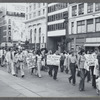 Group marching at "Save the Schomburg" Rally