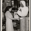 Ira Aldridge statue; a view of Schomburg Collection in the old building of 135th St Branch N.Y. Public Library  