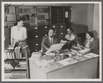 Catherine Latimer, Miss Lipscomb, Lawrence Reddick, and Roberta Thompson at the 135th St Library