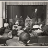 Dr. Samuel Sillen, Ralph Ellison, Lawrence Reddick, and William Attaway on the platform of the Harlem Library