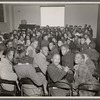 Young children in audience at movie screening at 135th St Branch Library