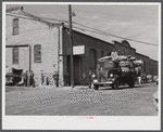 Transporting tobacco from warehouse after auction sale to the cigarette factories and storage warehouses. Danville, Virginia.