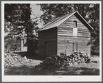Storing barns and woodpiles on Emery Hooper's farm near Prospect Hill. Caswell County, North Carolina.